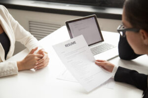 Why Manual Resume Writers Beat the ATS Game